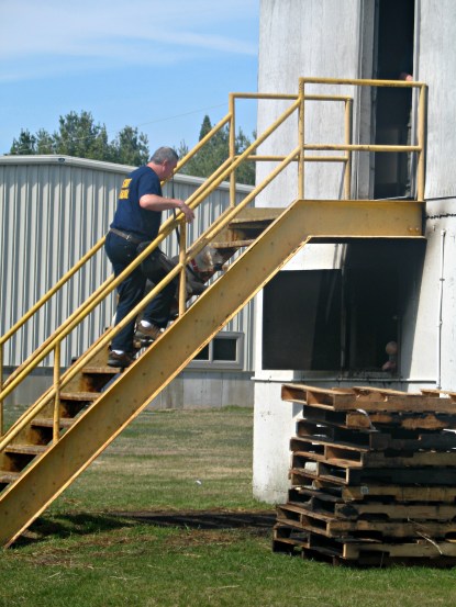 Arson Investigator Mitch Kushner and K-9 Zoe with the Illinois State Fire Marshal's office